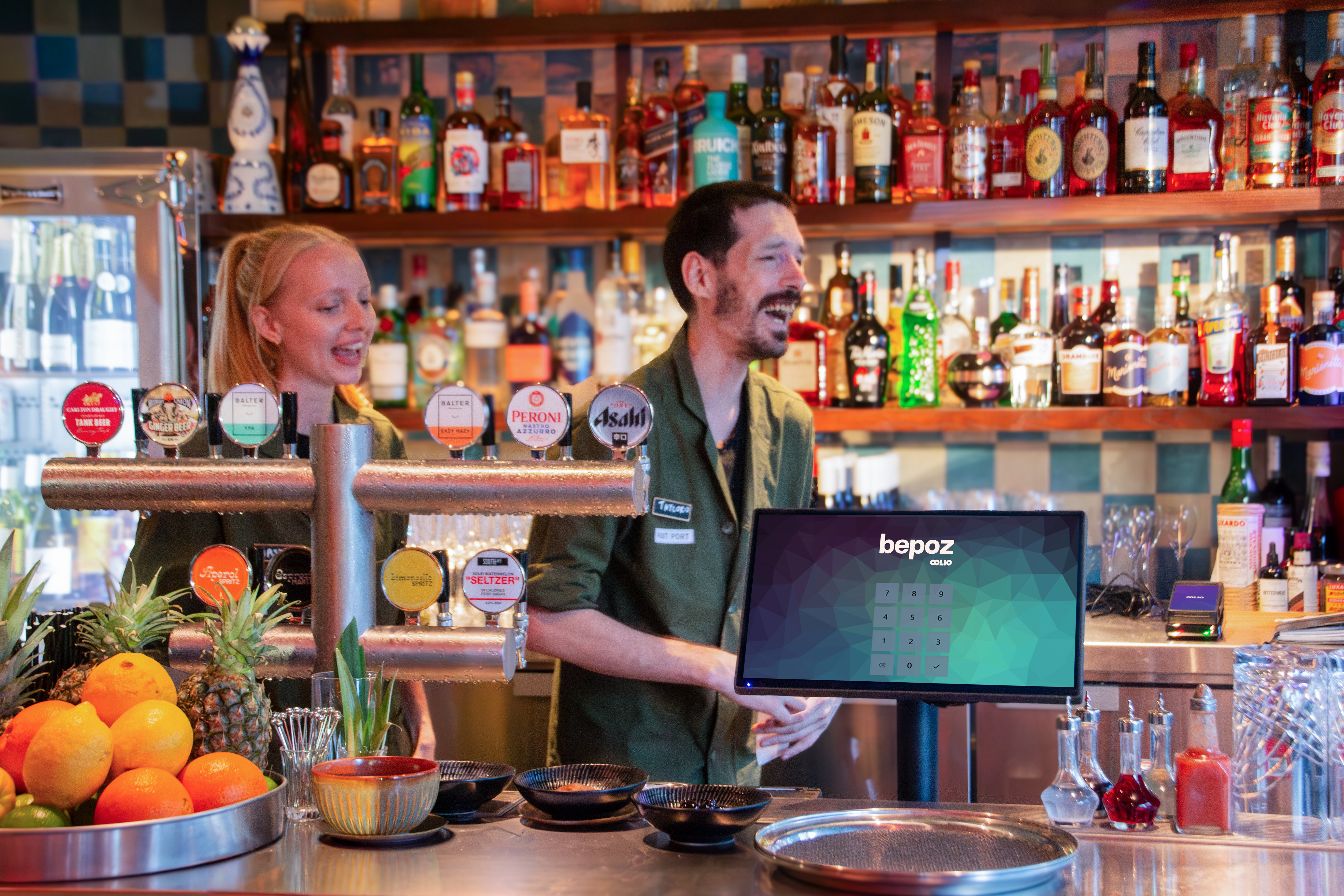 Staff members behind bar